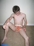 Nerdy twink Billy Gee loses his shirt and jeans and jerks