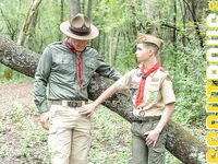 Mature gay scoutmaster Maxwell strips a twink and fucks him