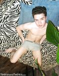 Hairy twink strips completely naked and shows off his small