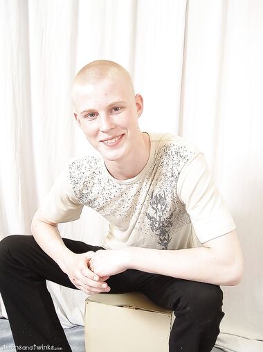 Hot twink shows off his fine ass and his uncut hairy cock