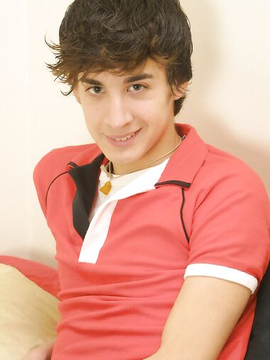 Handsome gay brunette Kai strips naked, rubs his firm ass