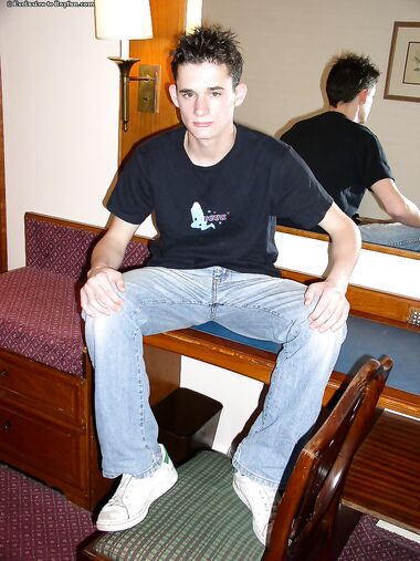 Handsome boy Danny Small strips naked and shows off his