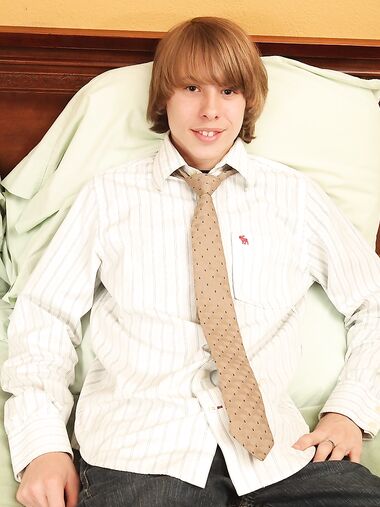 Cute twink Jade removes his work clothes and jerks off his