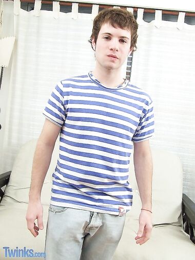 Hot twink Luciano A strips naked & jerks his uncut cock